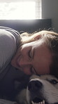 Love, hug and woman with dog in home for companion, connection or support for domestic animal. Embrace, pet or happy person with attention for weekend bonding, stroke or relax together in apartment