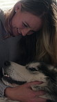 Love, stroke and woman with dog in home for companion, connection or comfort for domestic animal. Support, pet or happy person with attention for weekend bonding, care or relax together in apartment