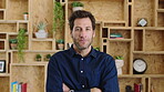 Business, face and man with arms crossed in office for news reporting, career growth and about us. Editor, person and serious at creative agency for writer, publishing industry and editing experience