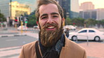 Happy, face or businessman in city with commute, good mood or confidence in property management. Laugh, wind or real estate agent with portrait, positive attitude or career pride with town travel.