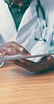 Clinic, doctor and hands with tablet, healthcare and scroll patient records on website or diagnosis. Health professional, online and person with tech, browsing and medical research for treatment plan