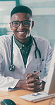 Face, glasses and healthcare with doctor black man in hospital for agenda, schedule or writing. Review, smile and typing with happy medical professional at desk in clinic for online calendar