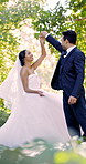 Dance, wedding or couple with smile in park, marriage commitment or ceremony tradition for relationship. Outdoor, spin and people with bonding on special day, love and happiness for celebration event