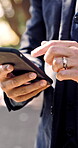 Hands, phone and text message with business man outdoor in park for communication, scrolling or search. App, social media and typing with employee in nature for connectivity, post or profile update