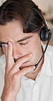 Man, headache and consultant with headset or stress in call center for customer service or mistake. Male person, frustrated agent or migraine with mic for virtual assistance or pressure in workplace