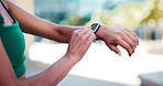 Hand, smartwatch and tracker for exercise, fitness or heart rate in city with performance progress. Athlete, person and typing with digital tech for monitoring workout, runner and wellness results