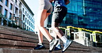 Fitness, runner and legs on stairs with people together for wellness, workout or cardio. Exercise, sports and athlete friends in city on steps for marathon training, health and team for endurance
