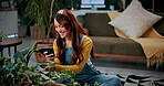 Phone, plant and picture with woman in home for botany app, horticulture check and inspection. Leaf identification, gardening tips search and eco friendly hobby with person in living room of house