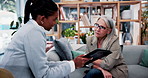 Old woman, tablet and consultant in home for finance, retirement planning or policy update. Elderly client, tech and insurance agent in living room for discussion, pension FAQ or online application