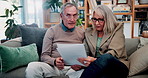 Home, paperwork or senior couple with financial records, mortgage planning or tax expenses. Sofa, elderly man and woman with budget, retirement savings or discussion with document for pension annuity