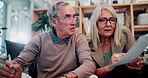 Home, paperwork or senior couple with insurance application, mortgage expenses or stress for debt. Sofa, elderly man or woman with bills, retirement crisis or writing on document for financial policy