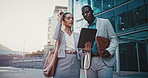Business people, team and planning in city with tablet for real estate listing, advice or project. Tech, conversation and workers in town for meeting, development idea or smile for property review