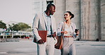 Walking, discussion and business people in city for planning legal trial in collaboration. Coffee, review and team of attorneys with commuting to office with conversation for law case in urban town.