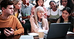 Talking, students and teacher with laptop on campus, education, help or explain project for knowledge. Teaching, lecturer or people with tech for college assignment, course support or tips for essay