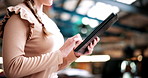 Student, hands and typing in college with tablet, online research and check enrollment for course. Bokeh, woman browse or scroll in university with tech, learning or registration for higher education