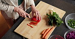 Above, hands and vegetables with person in kitchen of home for healthy meal preparation. Cooking, food and knife with senior woman at counter in apartment for cuisine, culinary hobby or recipe