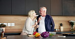Cooking, karaoke or old couple in kitchen with utensils, fun moment or bonding with culinary hobby. Happy, groove or senior people with meal prep, singing performance or playful connection in home.