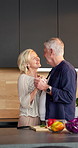 Cooking, dance and holding hands with old couple in kitchen of home together for bonding or meal prep. Connection, food and smile with senior people in apartment for fun, healthy eating or laughing