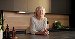 Pride, smile and face of old woman in kitchen with retirement, calm and positive personality. Funny, pensioner and elderly person in home, laughing or happiness with confidence, morning and optimism