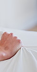 Woman, hands and bed with duvet for intimacy, sexual tension or morning pleasure in home. Closeup, female person or grip with blanket or sheets for bedroom romance, sensual relief or comfort in house