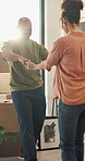 Real estate, happy or couple in home with dance, fresh start or fun moment in dream house. Property, flare or people with playful groove, housing success or moving achievement for new homeowners.