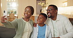 Family, smile and selfie with child in lounge, black people and memory with son on social media app. Parents, happy mom and dad with kid in living room, bonding and profile picture with boy in house