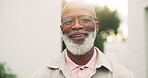 Smile, face and senior man in backyard for peaceful morning, fresh air and comfortable retirement. Pensioner, black person and happy with glasses outdoor at home for weekend break, wellness and relax