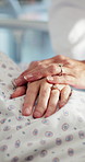 Hands, hospital and patient in bed for comfort, empathy and support for medical recovery. Healthcare, closeup and doctor with person for compassion, care and console for wellness, results or healing