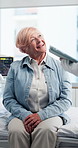 Senior woman, talking and nurse with tablet, healthcare or happy for medical appointment in hospital. Clinic, health professional and discussion with elderly person, smile and test results on website