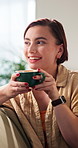 Break, thinking and woman with coffee on sofa for wellness, calm and peaceful on weekend morning. Home, thoughtful and person with drink for reflection, inspiration and good mood in living room