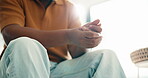 Thinking, anxiety and nervous with hands of person in home for fear, decision or psychology. Waiting, reflection and trauma recovery with low angle of man in house for worry, mental health and stress