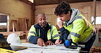 Discussion, men and carpenters with documents in workshop for planning, meeting or furniture production. Collaboration, conversation and team of woodworkers with paperwork for inventory in warehouse.