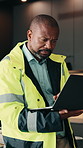 Black man, architect and reading at house with laptop, research and email for architecture. Mature person, typing and pc for survey update, quality assurance and information for property development