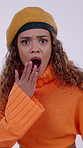 Woman, face and shock with reaction in studio, news or announcement with drama on white background. Gossip, info or wow expression in portrait, female person and mind blown with secret or surprise