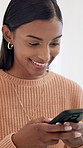Phone, smile and woman in home for texting, social media or chatting on mobile app on weekend. Happy, technology and female person with cellphone for online communication with website in apartment.