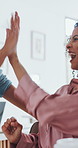 Happy, people and high five in office with laptop, embrace and well done for creative business award. Excited, women and hug in agency with computer, celebration and announcement for company success.
