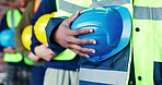 Building, hands and helmet with construction worker group on worksite for project management. Architecture, hard hat and safety with team of men in row at development site for civil engineering