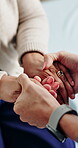 Comfort, holding and hands of old woman and nurse in home for sympathy, support and healthcare. Medical advice, caregiver and compassion with people in house for consulting, trust and empathy