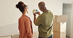 New house, couple and paint swatch for interior design, property remodeling or discuss decision. African man, woman or color options for wall renovation, home decor or help with real estate from back