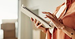 Scrolling, tablet and hands of woman in new home for online shopping, purchase or ecommerce. Digital technology, website and female person with furniture order on app for renovation in apartment.