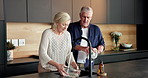 Washing dishes, kitchen and senior couple in home with bonding, hygiene or chores in marriage. Happy, talking and elderly man helping woman with cleaning bowls by sink with conversation in house.
