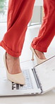 Destroy, laptop and feet of business woman with mistake, anger and frustrated for online error. Stress, office and person with computer for damage, smash and angry for problem, crisis and disaster