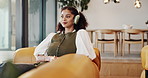 Relax, woman or thinking with headphones on couch for nostalgic music, radio or weekend break. Thoughtful, person or streaming sound in home for peaceful morning, memory or audiobook reflection