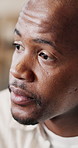 Thinking, doubt and black man in home with mistake, pressure or anxiety for unemployment. Stress, planning and African male person in living room with reflection, bad news or job loss in house.