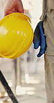 Walking, helmet and back of person for construction site, inspection and review for building project. Architecture, contractor and legs of worker with ppe for engineering, safety compliance and labor