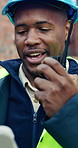 Tablet, black man and radio on construction site for task brief, inspection update or conversation. Industrial, engineer or communication with tech, progress report or project coordination for repair