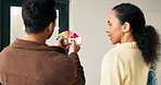 Back, couple and talk art new house with swatches, paint sample and ideas for interior design. People, discussion and planning in lounge with color palette, renovation and diy makeover for remodeling