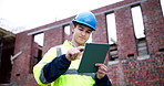 Engineer, man and typing on construction site with tablet, planning and check building safety report. Low angle, person and thinking outdoor with tech, civil engineering compliance or online research