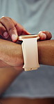 Hands, athlete and woman with smart watch for fitness, timer and monitor heart rate for exercise. Person, touch and runner with wristwatch for tracking speed, progress performance and sports results