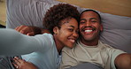 Selfie, happy and face of couple on bed for memory, bonding or social media post for anniversary. Smile, portrait and black man with woman for photography picture in hotel for connection in marriage.